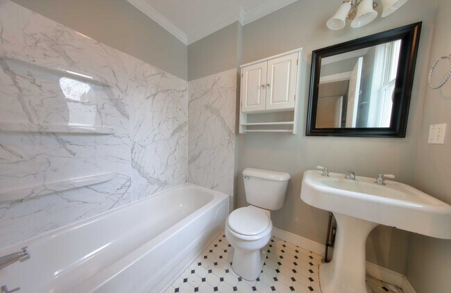 Building Photo - This classic 3 bedroom 2 bath Webster home features a front porch, large deck off the kitchen for...