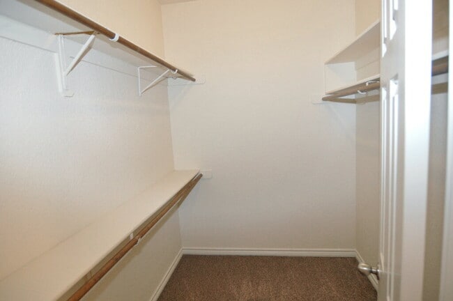 Building Photo - "Warm And Welcoming 3-2-2 With Open Living In a Prime Location!"