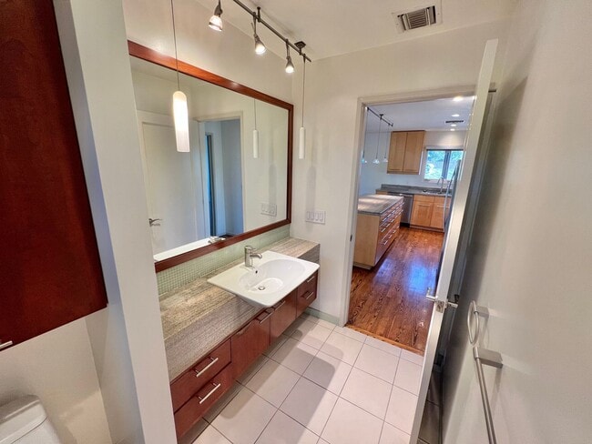 Building Photo - Spacious 3BR Bluff Heights Home | Gated Yard, Garage & Modern Upgrades