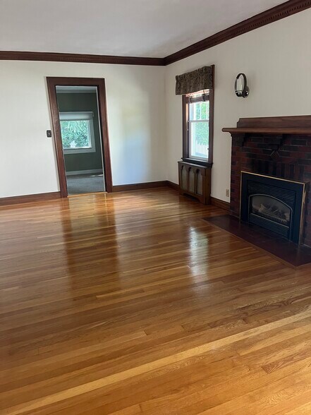Living room with gas fireplace - 27 Clearwater Dr