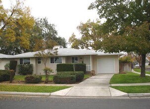 Building Photo - Updated 3 bedroom 2 bathroom home with large backyard, corner lot, close to shopping and schools ...