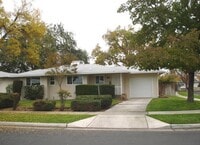 Building Photo - Updated 3 bedroom 2 bathroom home with large backyard, corner lot, close to shopping and schools ...