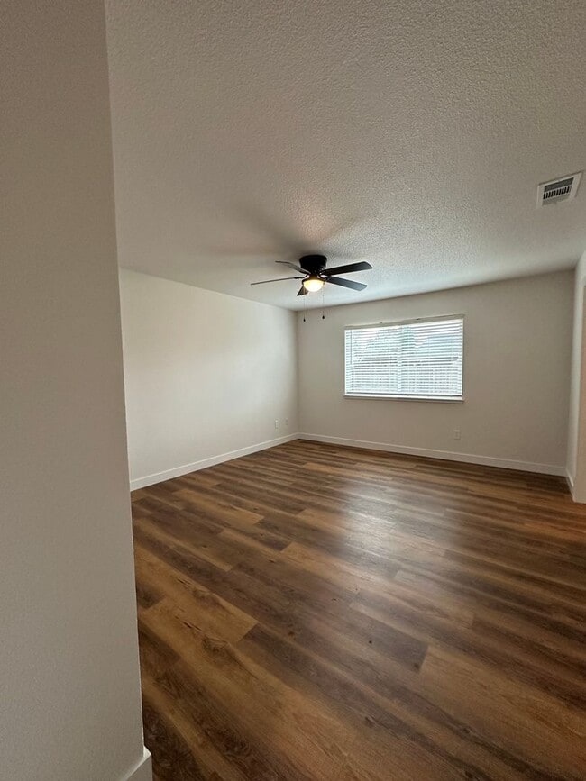 Building Photo - Updated Home with Island Kitchen, LVP Flooring, and Yard Care Included!