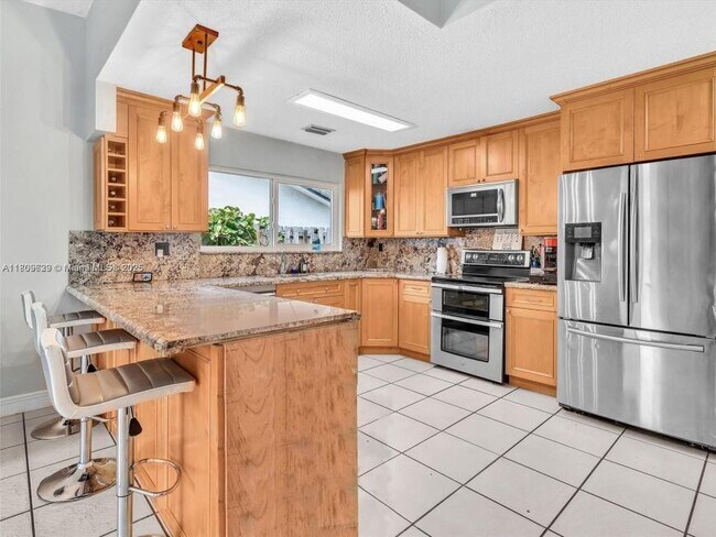 Building Photo - 3 bedroom in Cooper City FL 33330