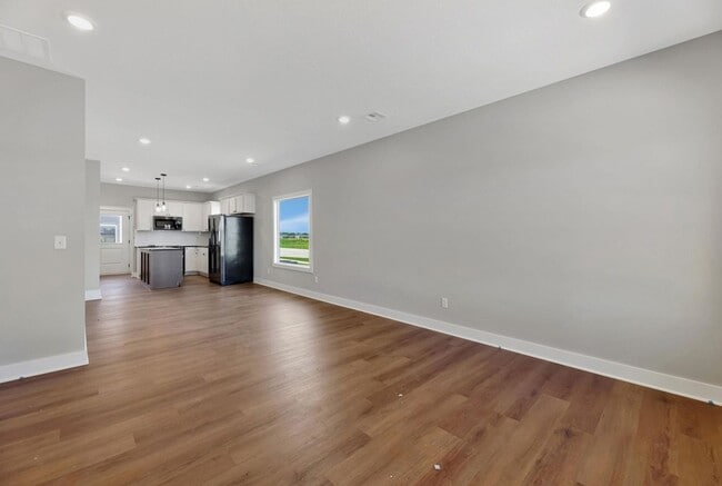Building Photo - Modern 3-Bed Ranch in Maize – Zero-Entry L...