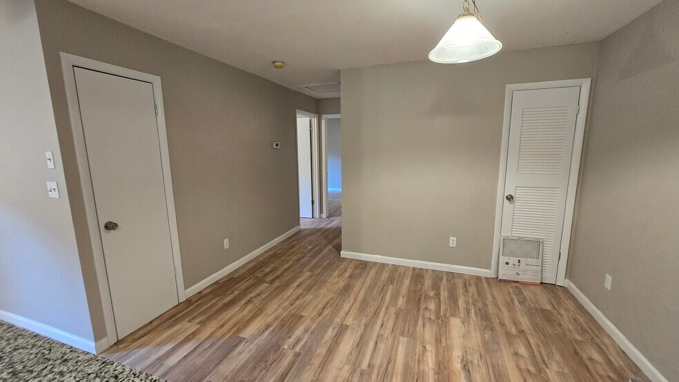 Dining area with storage closet on left and HVAC closet on the right side of photo - 4226 SW 69th Ter