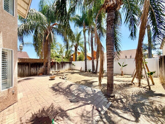 Building Photo - Open-Concept 3 Bedroom 2.5 Bathroom Home with Soaring Ceilings & Spacious Backyard