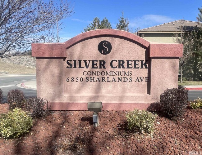 Building Photo - Discover Your Dream Condo with Stunning Mountain Views a 1 Car Garage & Covered carport in NW Ren...