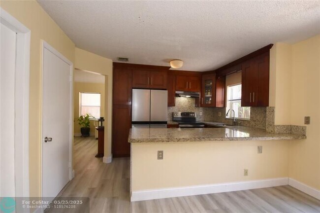 Building Photo - 10691 NW 12th Dr
