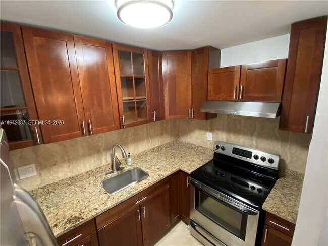 Building Photo - 11398 Royal Palm Blvd