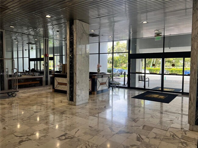 Building Photo - 3675 N Country Club Dr