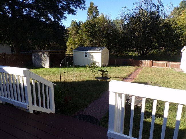 Building Photo - Well maintained cute house with huge fence...