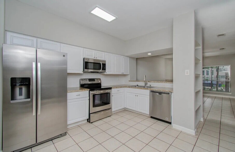 Kitchen includes fridge, stove/oven & microwave - 12697 Briar Patch Rd