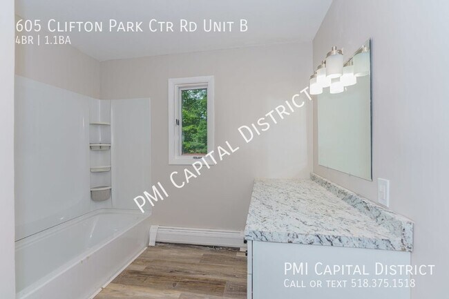 Building Photo - Spacious 1800 SF 4 bedroom, 1.5 bath raise...