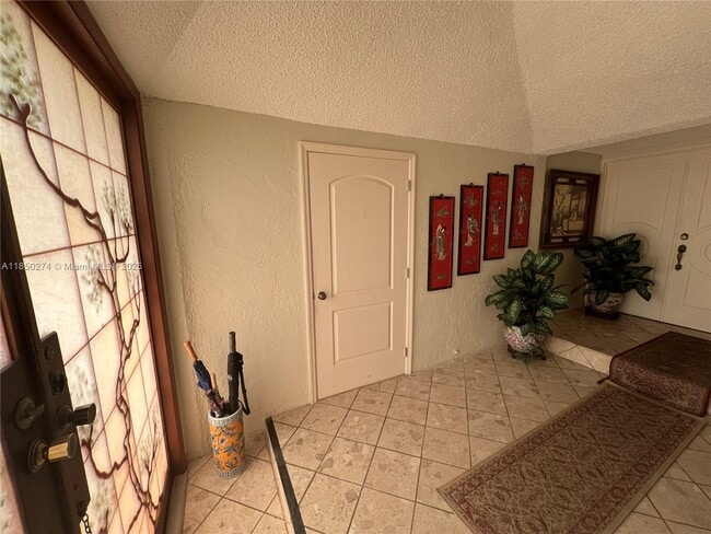 Building Photo - 9501 E Calusa Club Dr