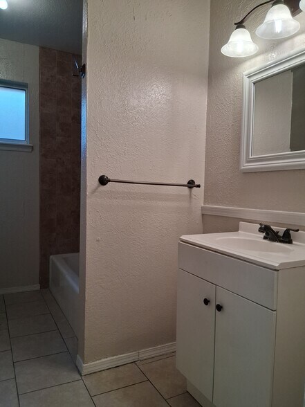 Building Photo - 6917 Alto Rey Ave Apt A
