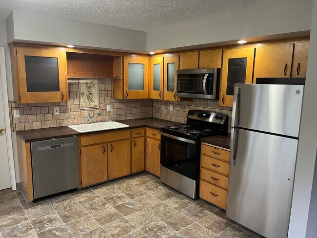 Building Photo - Charming 3 Bedroom with a Living Room, Sun Room,Huge Fenced Yard & More!