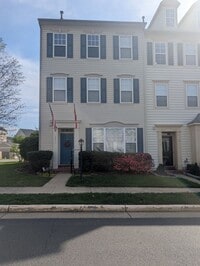 Building Photo - END UNIT STUNNER!