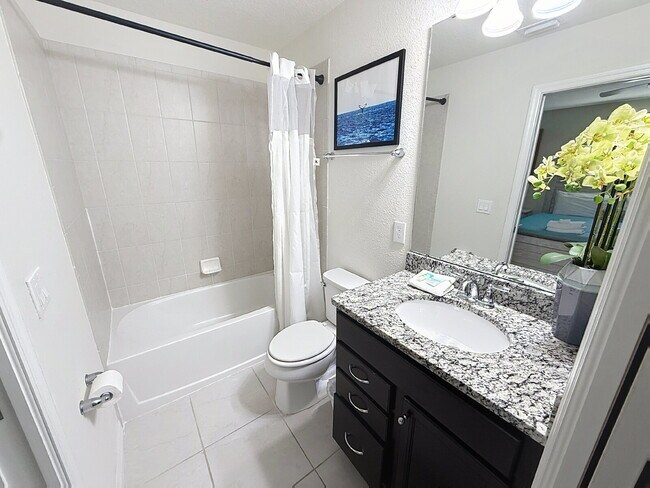 Building Photo - Welcome home to the fully furnished 5-bedroom, 5.5-bathroom private pool home located in Windsor ...