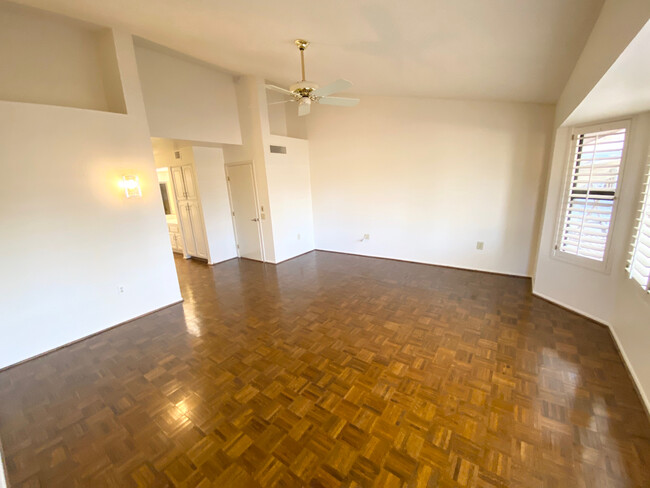 Wood parquet floors in 2 bdrms, look great with a large rug - 13722 W Elmbrook Dr