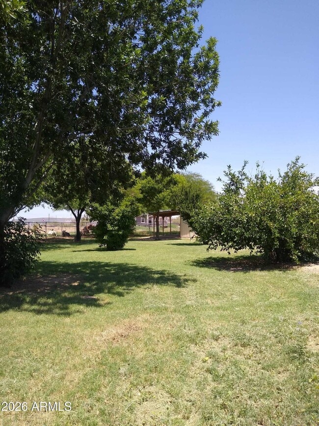 Building Photo - 242 N Pima Rd