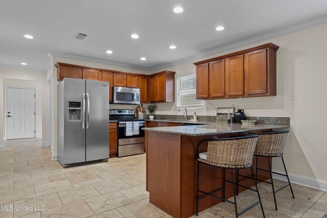 Building Photo - Beautifully Remodeled Home in Historic Gulf Hills, Golf Course Community!