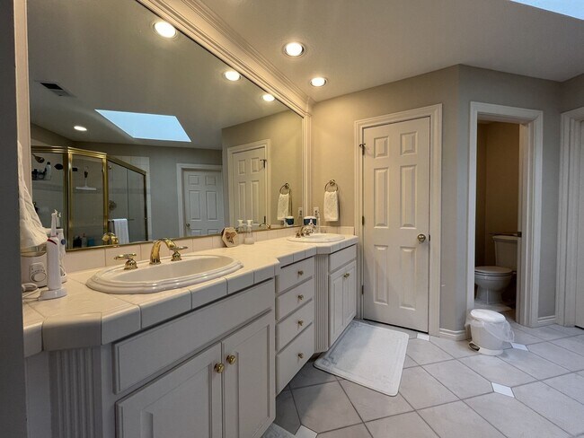 Building Photo - Executive-Style Northwest Heights Home with Forest Views and Refined Architectural Details