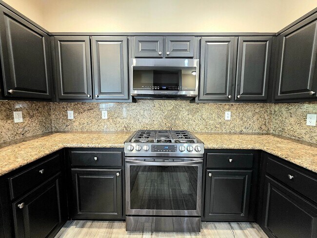 Building Photo - Three-bedroom Single Family