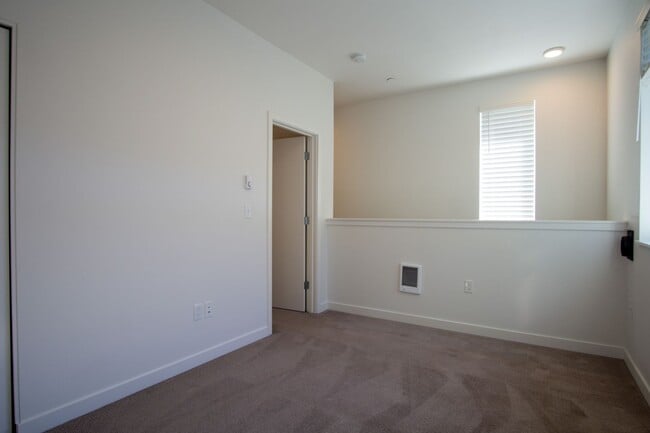 Building Photo - APPS ON US! Modern & Sleek One-Bedroom Tow...