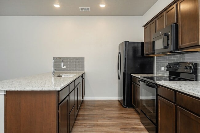 Building Photo - Spacious Townhome Available Now!