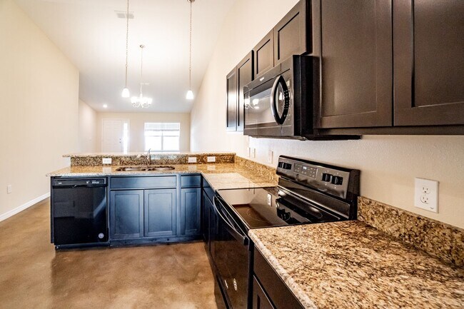 Building Photo - MOVE IN SPECIAL- Beautiful 3/2 Energy Effi...