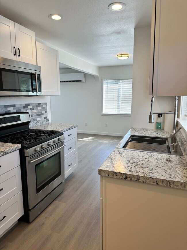 Building Photo - Completely remodeled Adorable home in Conv...