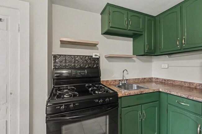 Building Photo - One bed, partially furnished, all utilities included