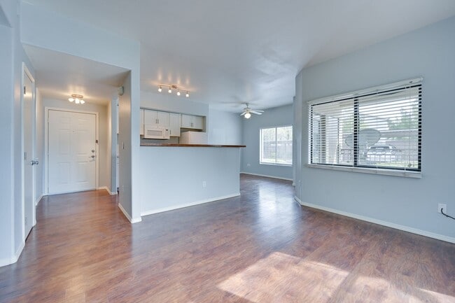 Building Photo - NW!! Gated!!! Clubhouse!!!Community Pool!!! 1st Floor Condo!!! Wood like floors!! No Carpet!!