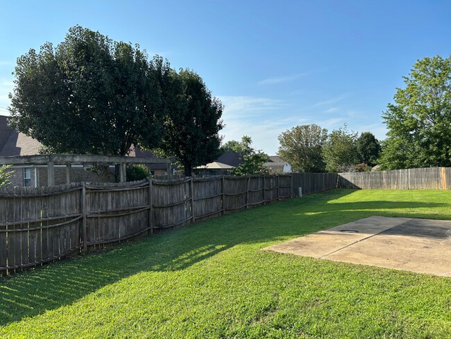 Building Photo - Spacious 4BR/2BA Olive Branch Home | 1,965 Sq Ft, Modern Fireplace, Bay Window & 2-Car Garage