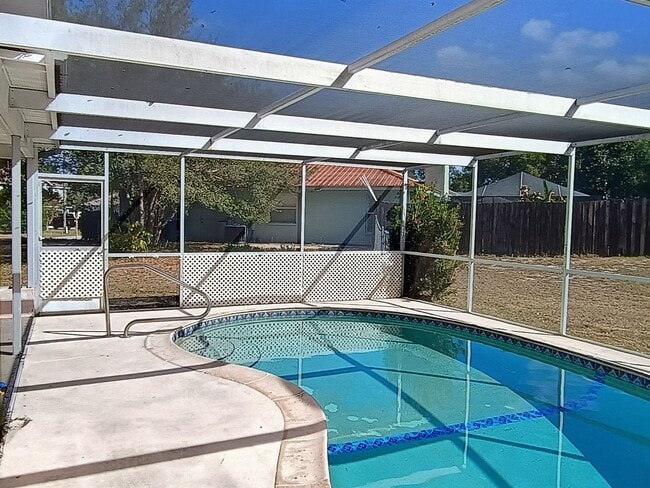 Building Photo - Pool. Privacy. Perfect location. Available now!