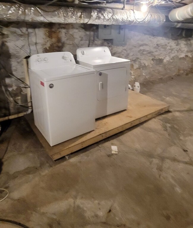 Shared Laundry appliances in cellar - 350 E 20th Ave