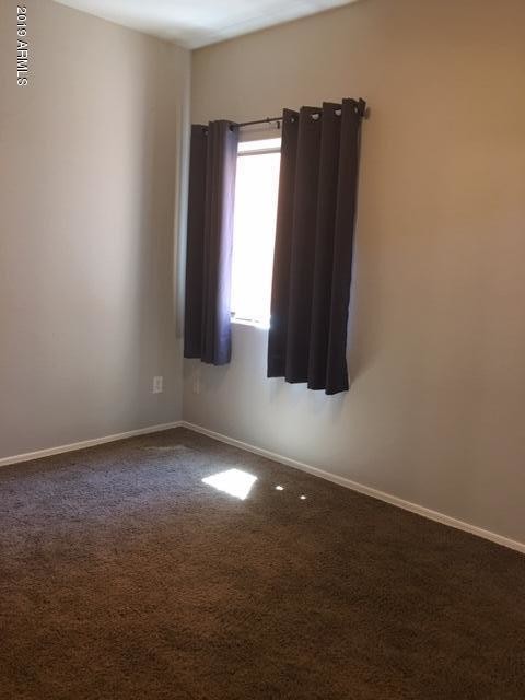 Building Photo - 8940 W Olive Ave