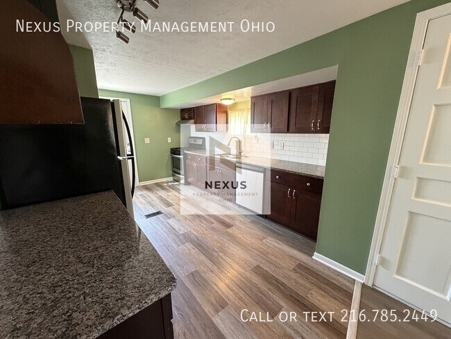 Building Photo - 6475 Sandfield Dr