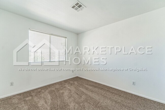 Building Photo - 9021 Iron Hitch Ave
