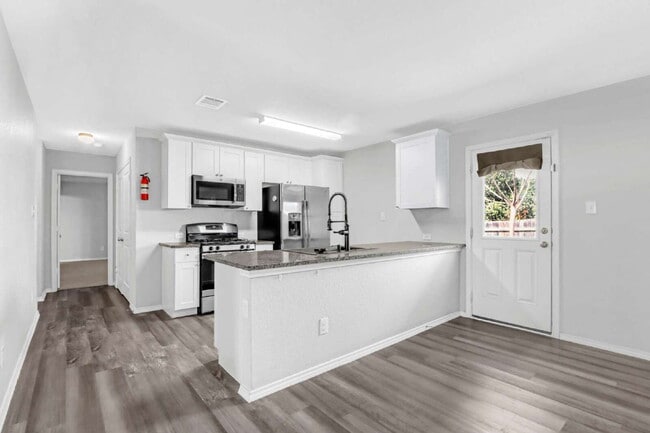 Building Photo - "Charming 3-Bedroom, 2-Bath Home Retreat with Solar Panels! 10% off for active service members!"