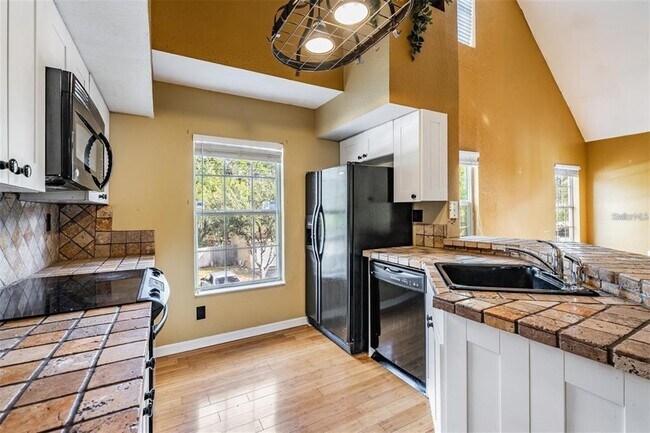 Building Photo - 9156 Lake Chase Island Way