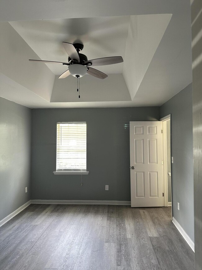 Building Photo - 4312 Wild Rose Dr