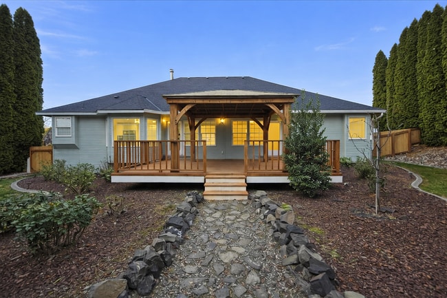 Building Photo - Executive 3 Bed Home with 3 Car Garage & Private Fenced Yard