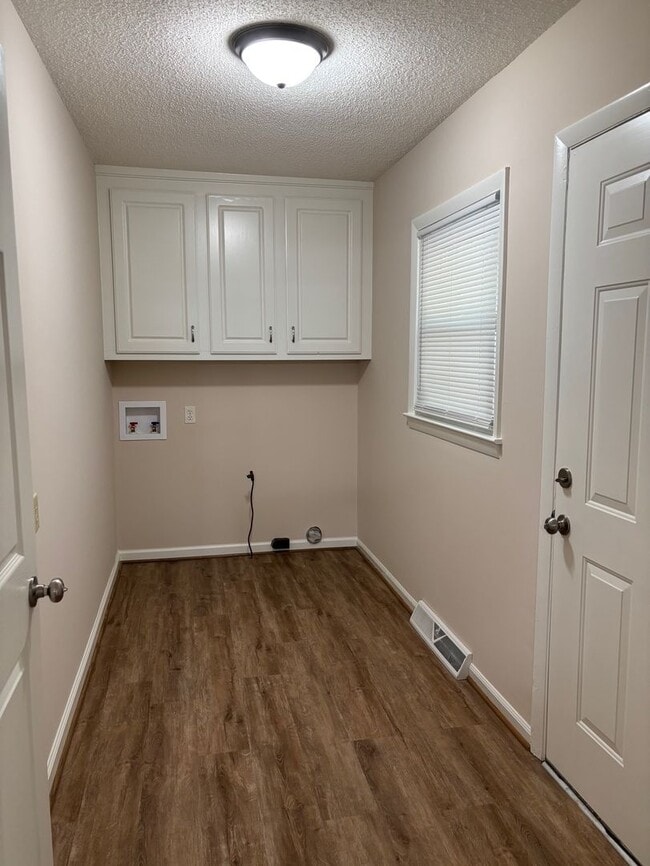 Building Photo - Nice brick home, single carport, storage b...