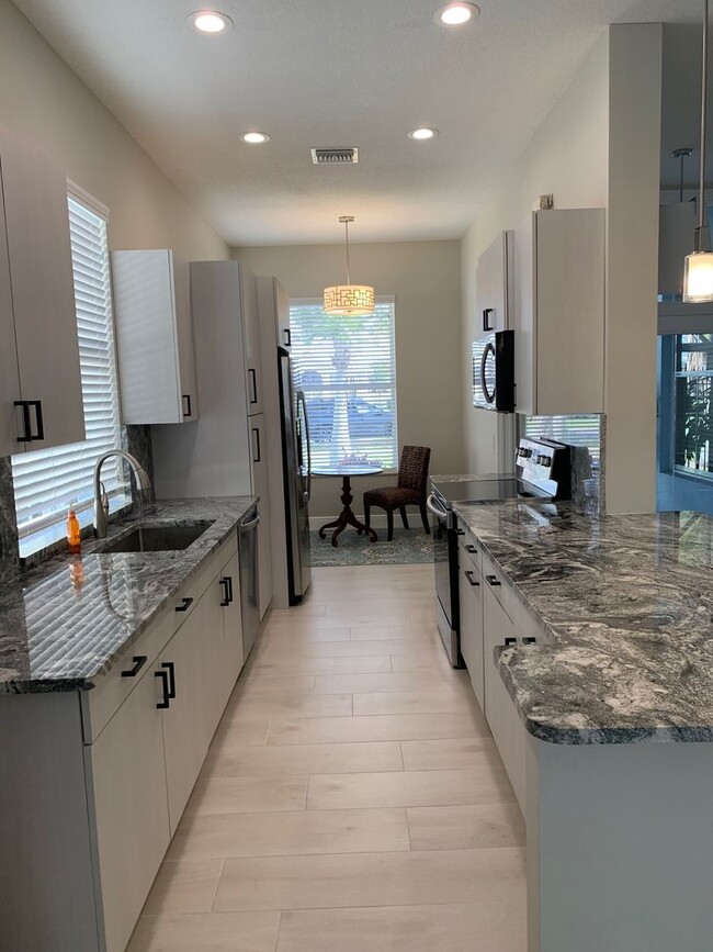 Building Photo - COMING SOON! Fully renovated 3/2/2 House i...