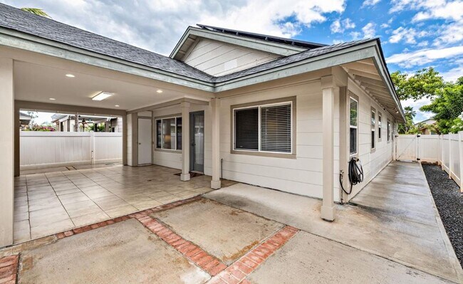 Building Photo - Single Story with large covered patio. Two car garage with uncovered gated parking stall. New vin...