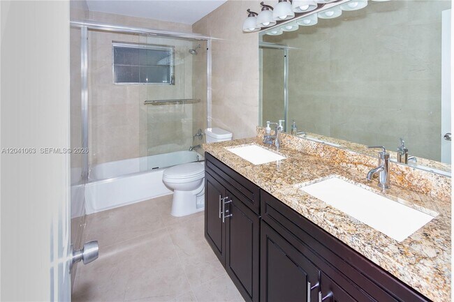 Building Photo - 16641 Royal Poinciana Dr