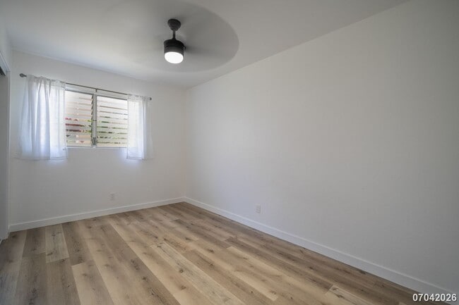 Building Photo - Rarely available ground floor townhome unit! 2 bdrm/2 bath/1 parking at Waiau Gardens Villa in Pe...