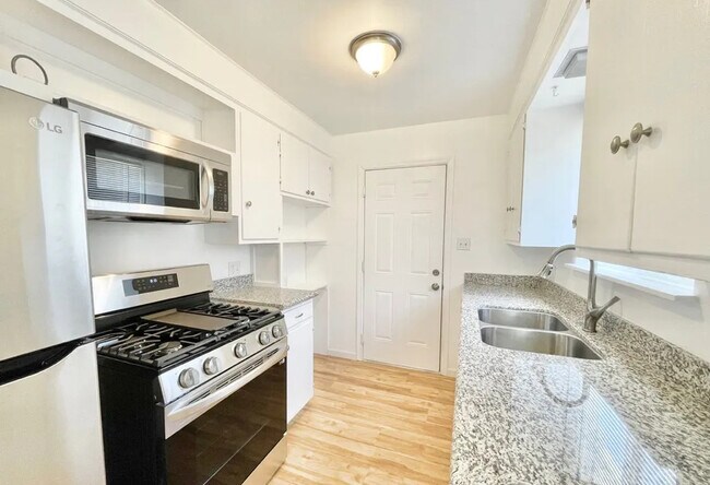 Building Photo - 6382 14th Ave